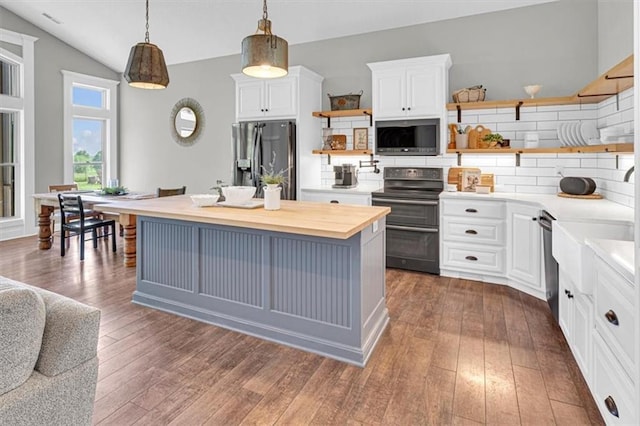 9425 NE 188th St, Trimble, MO 64492 - kitchen with open shelves, appliances with stainless steel finishes, wooden counters, tasteful backsplash, and dark wood finished floors