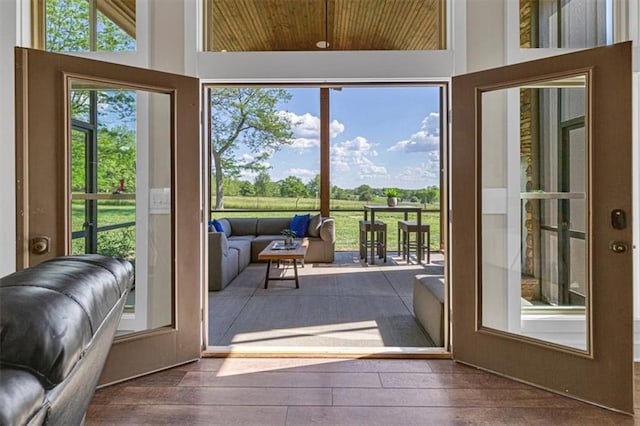 9425 NE 188th St, Trimble, MO 64492 - entryway featuring high vaulted ceiling, dark wood-style flooring, and wooden ceiling