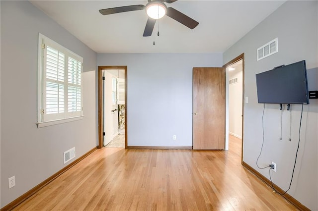 15609 E 43rd St S, Independence, MO 64055 - unfurnished bedroom with light wood finished floors, baseboards, and ceiling fan