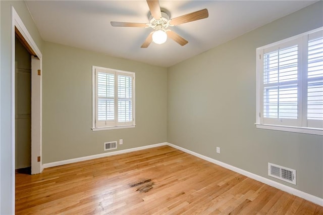 15609 E 43rd St S, Independence, MO 64055 - unfurnished bedroom with light wood-style flooring, baseboards, and a ceiling fan