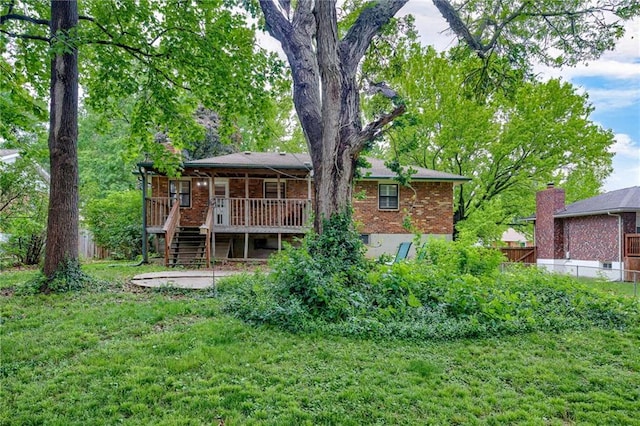 15609 E 43rd St S, Independence, MO 64055 - rear view of property featuring stairway, brick siding, and a deck