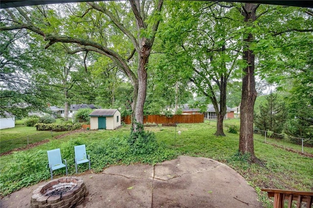 15609 E 43rd St S, Independence, MO 64055 - view of yard with an outdoor fire pit and a patio
