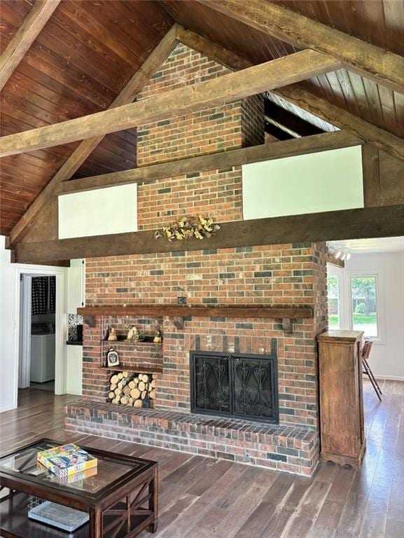 1702 Countryside Dr, Pittsburg, KS 66762 - living room featuring high vaulted ceiling, wood ceiling with exposed beams, a fireplace, and wood-type flooring