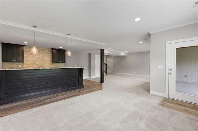 20611 W 113th St, Olathe, KS 66061 - indoor wet bar with crown molding, light carpet, recessed lighting, and hanging light fixtures