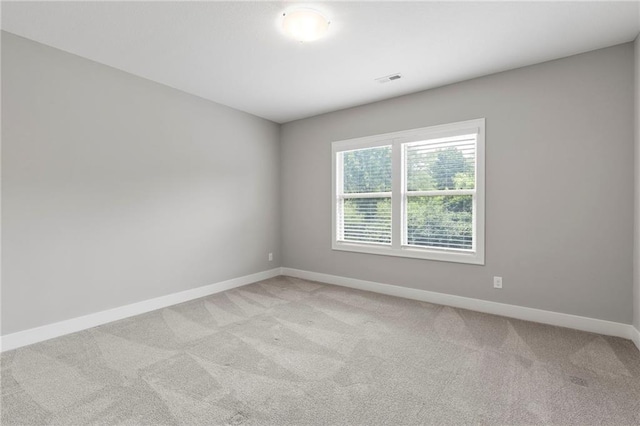 20611 W 113th St, Olathe, KS 66061 - unfurnished room with baseboards and light colored carpet