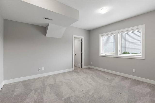 20611 W 113th St, Olathe, KS 66061 - spare room featuring light colored carpet and baseboards