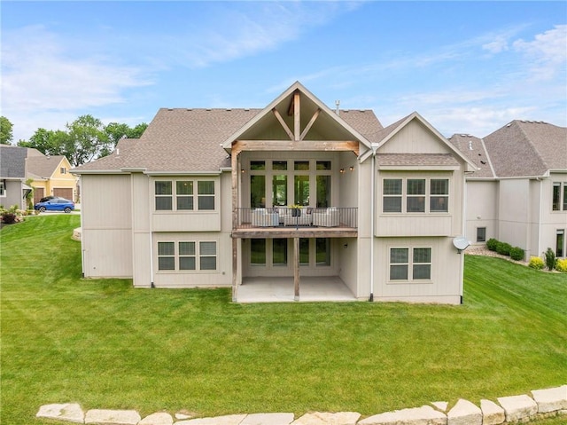 20611 W 113th St, Olathe, KS 66061 - rear view of house with a patio area, a lawn, a shingled roof, and a balcony