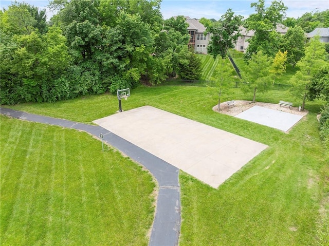 20611 W 113th St, Olathe, KS 66061 - view of grassy yard with basketball court