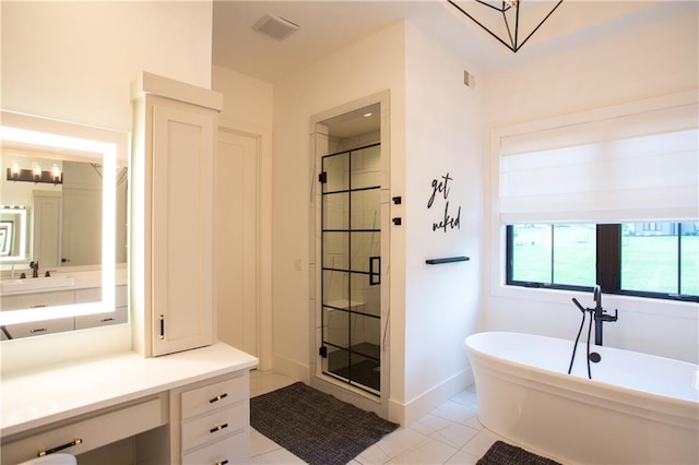 10702 W 142nd Ter, Overland Park, KS 66221 - bathroom featuring a shower stall, vanity, a soaking tub, and marble finish floors