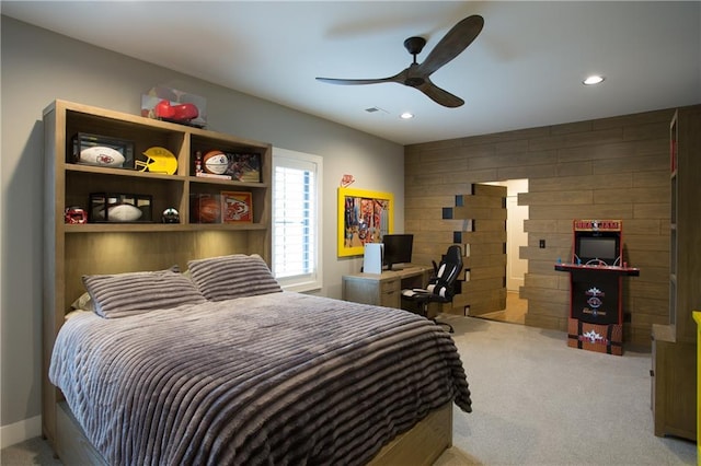 10702 W 142nd Ter, Overland Park, KS 66221 - bedroom featuring carpet flooring, recessed lighting, a ceiling fan, and wood walls