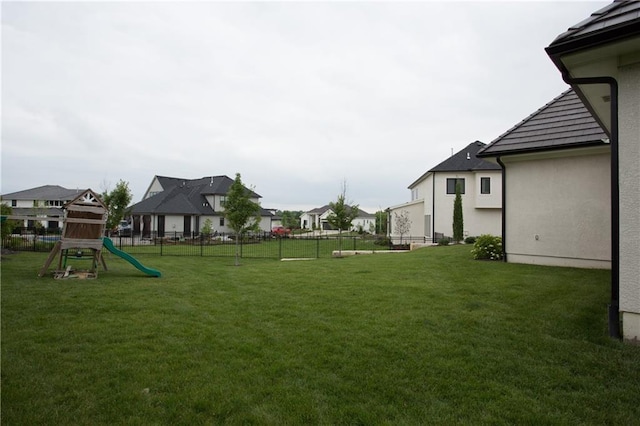 10702 W 142nd Ter, Overland Park, KS 66221 - view of yard featuring a playground and a residential view
