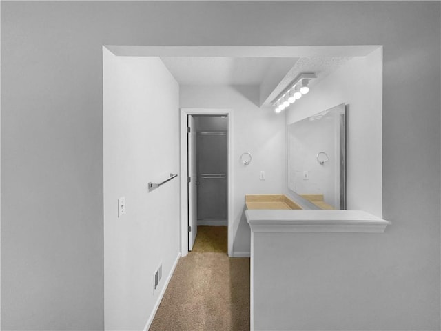 2157 E 154th St, Olathe, KS 66062 - hallway featuring carpet floors and baseboards