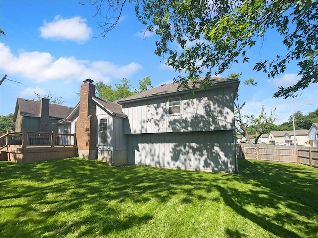 2157 E 154th St, Olathe, KS 66062 - rear view of house featuring a deck
