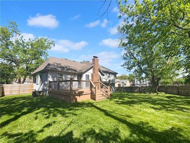 2157 E 154th St, Olathe, KS 66062 - rear view of house with a deck and a chimney