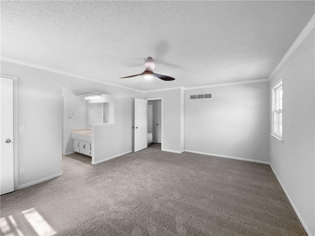 2157 E 154th St, Olathe, KS 66062 - unfurnished bedroom with crown molding, carpet flooring, a textured ceiling, baseboards, and ceiling fan