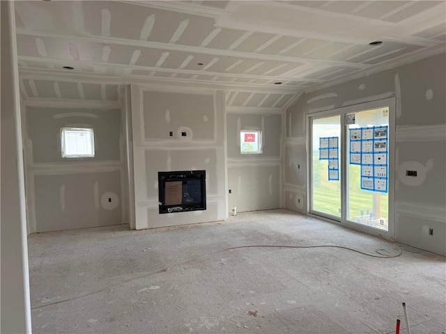 15349 W 173rd Ter, Olathe, KS 66062 - unfurnished living room with a glass covered fireplace