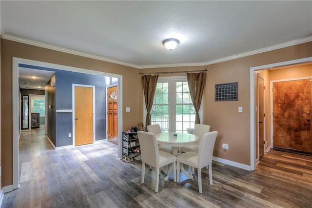 1875 E Mechanic Ave, Independence, MO 64050 - dining room featuring wood finished floors and ornamental molding