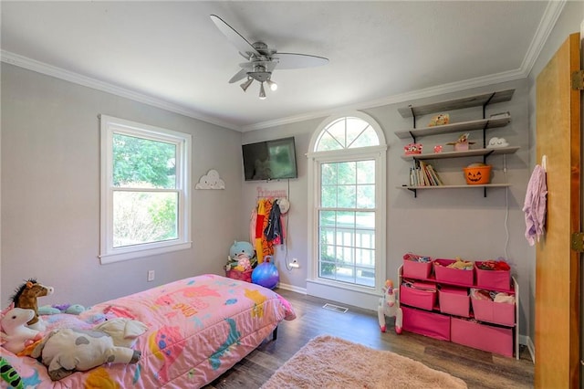 1875 E Mechanic Ave, Independence, MO 64050 - bedroom with multiple windows, wood finished floors, crown molding, and ceiling fan