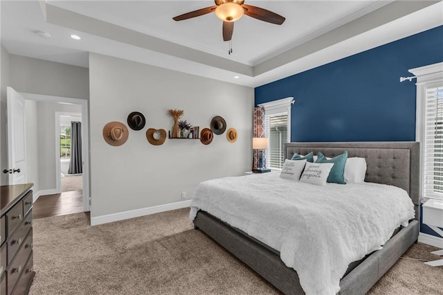 2409 SE Ridge Line Dr, Blue Springs, MO 64014 - carpeted bedroom with baseboards, multiple windows, recessed lighting, ornamental molding, and a ceiling fan