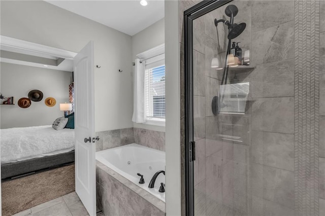 2409 SE Ridge Line Dr, Blue Springs, MO 64014 - ensuite bathroom featuring a jetted tub, a stall shower, and tile patterned flooring