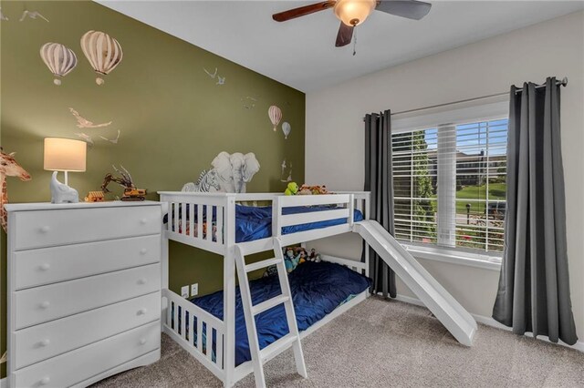 2409 SE Ridge Line Dr, Blue Springs, MO 64014 - bedroom with carpet floors and ceiling fan