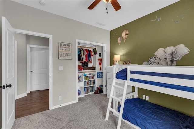 2409 SE Ridge Line Dr, Blue Springs, MO 64014 - carpeted bedroom featuring baseboards and ceiling fan