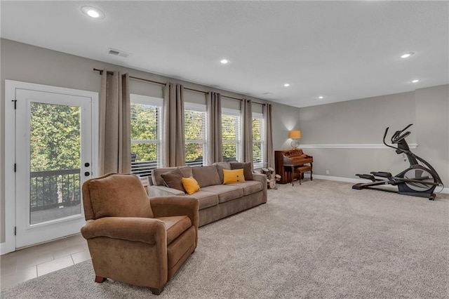 2409 SE Ridge Line Dr, Blue Springs, MO 64014 - living room with recessed lighting, baseboards, and light colored carpet