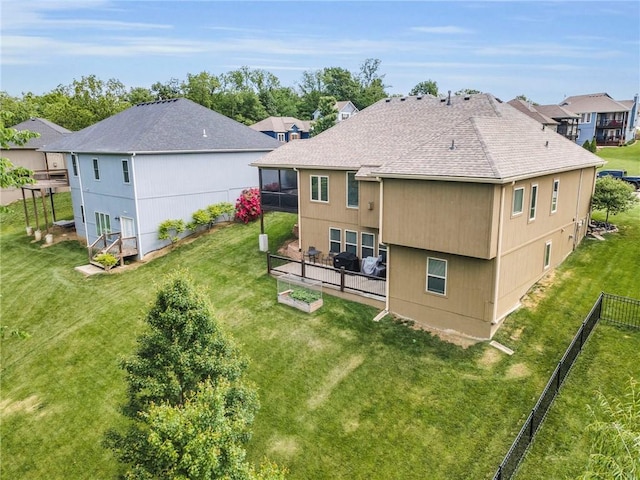 2409 SE Ridge Line Dr, Blue Springs, MO 64014 - back of property with roof with shingles and a residential view
