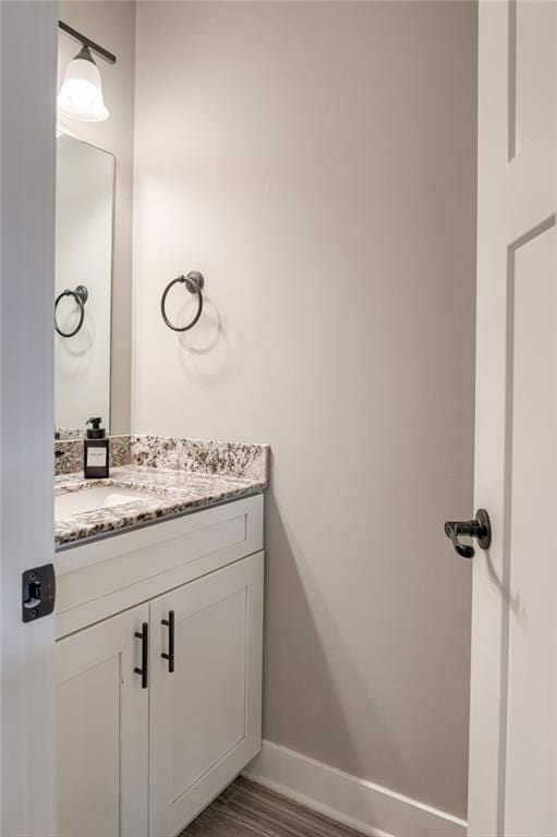 12435 Parkview Ave, Kansas City, KS 66109 - bathroom with vanity and baseboards