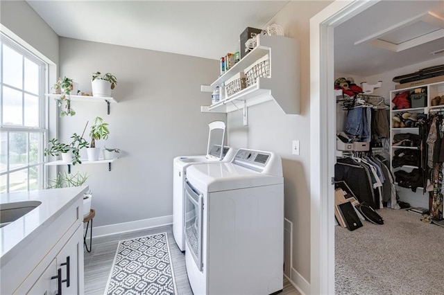12435 Parkview Ave, Kansas City, KS 66109 - laundry area with independent washer and dryer and baseboards