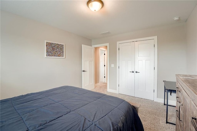 12435 Parkview Ave, Kansas City, KS 66109 - bedroom featuring light carpet, baseboards, and a closet