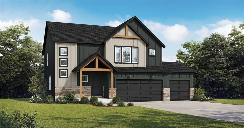 502 Woodview Dr, Raymore, MO 64083 - view of front of home with roof with shingles, concrete driveway, a front lawn, and board and batten siding