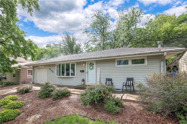 6109 W 54th Ter, Mission, KS 66202 - ranch-style house featuring a garage