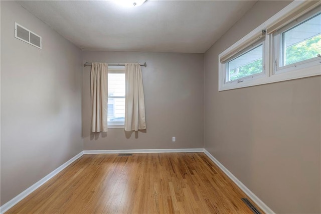 6109 W 54th Ter, Mission, KS 66202 - spare room with light wood finished floors and baseboards