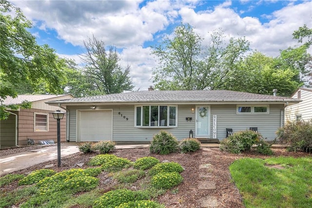 6109 W 54th Ter, Mission, KS 66202 - single story home featuring driveway and an attached garage