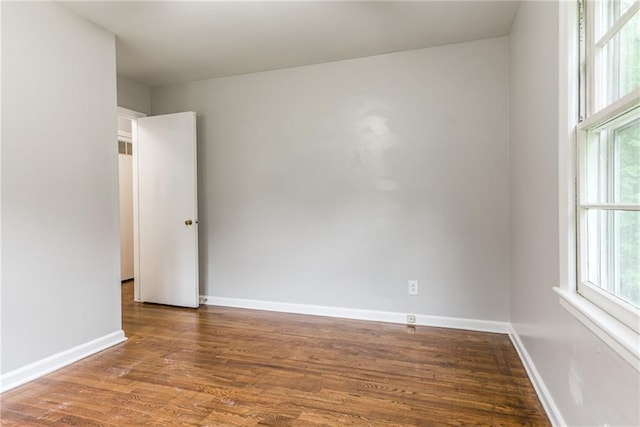 6721 Larsen Ln, Shawnee, KS 66203 - unfurnished room with wood finished floors and baseboards
