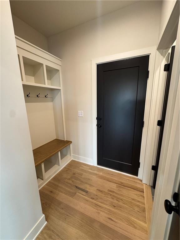 9019 Freedom Cir, Lenexa, KS 66227 - mudroom with baseboards and wood finished floors