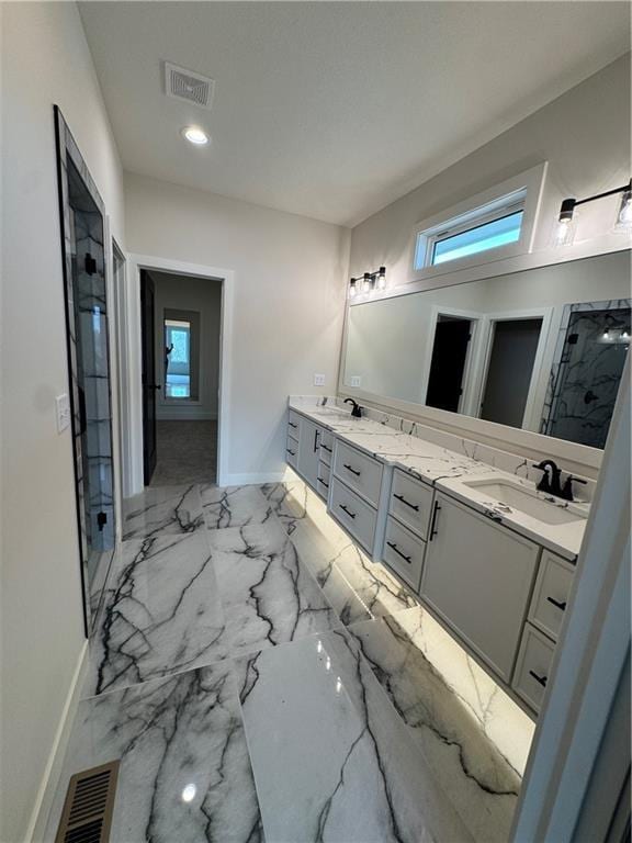 9019 Freedom Cir, Lenexa, KS 66227 - full bath featuring double vanity, a shower stall, baseboards, recessed lighting, and marble finish floors