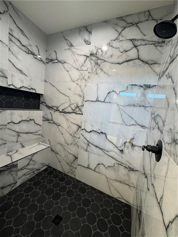 9019 Freedom Cir, Lenexa, KS 66227 - full bath featuring a marble finish shower
