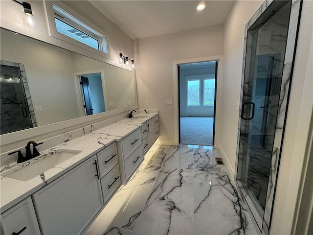 9019 Freedom Cir, Lenexa, KS 66227 - full bath with marble finish flooring, a marble finish shower, double vanity, baseboards, and recessed lighting