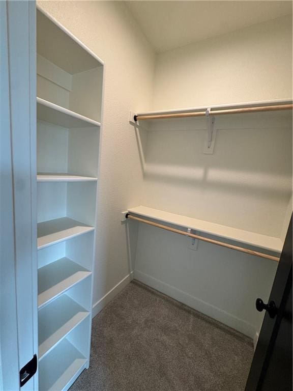 9019 Freedom Cir, Lenexa, KS 66227 - spacious closet featuring dark carpet