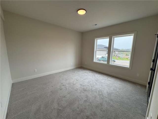 9019 Freedom Cir, Lenexa, KS 66227 - empty room featuring carpet flooring and baseboards