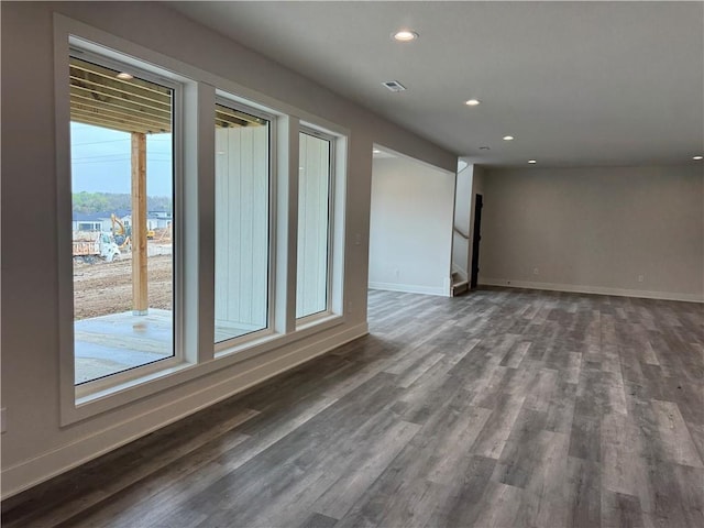 9019 Freedom Cir, Lenexa, KS 66227 - unfurnished room with recessed lighting, dark wood-style flooring, baseboards, and stairs