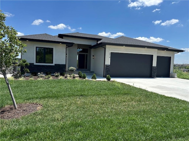 9019 Freedom Cir, Lenexa, KS 66227 - prairie-style home featuring a garage, concrete driveway, stucco siding, and a front yard