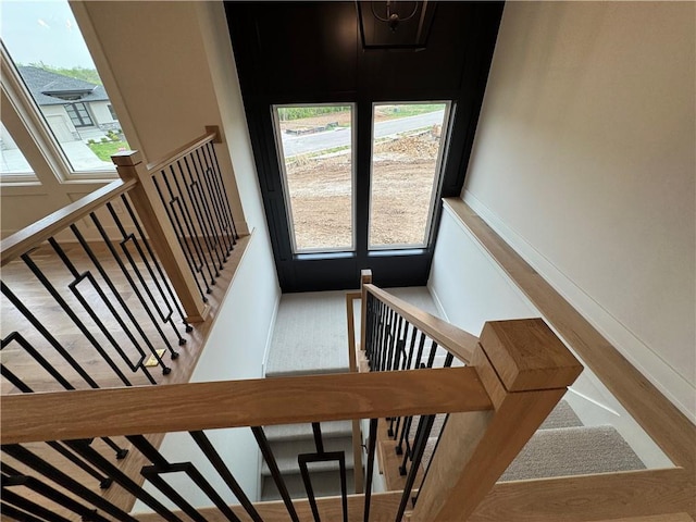 9019 Freedom Cir, Lenexa, KS 66227 - staircase featuring baseboards