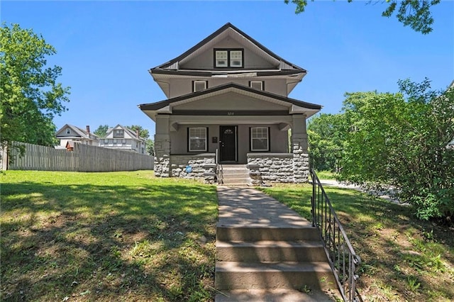 3218 Benton Blvd, Kansas City, MO 64128 - view of front of property featuring stone siding and covered porch