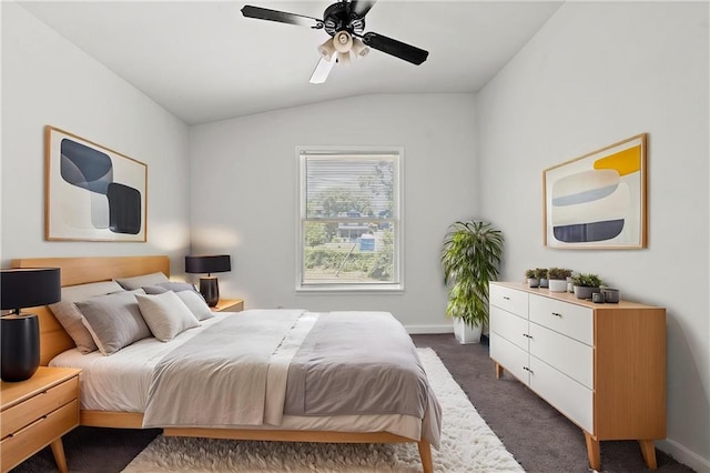3218 Benton Blvd, Kansas City, MO 64128 - bedroom featuring dark colored carpet, lofted ceiling, baseboards, and ceiling fan