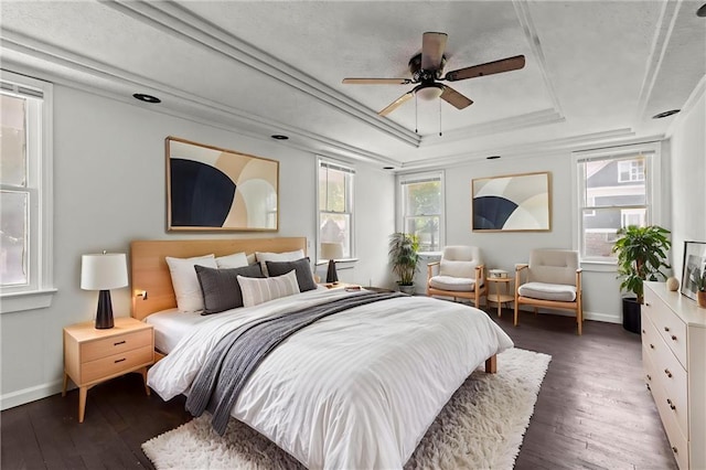 3218 Benton Blvd, Kansas City, MO 64128 - bedroom featuring a tray ceiling, baseboards, hardwood / wood-style flooring, and ceiling fan