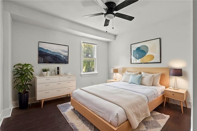 3218 Benton Blvd, Kansas City, MO 64128 - bedroom featuring dark wood-type flooring, baseboards, and ceiling fan