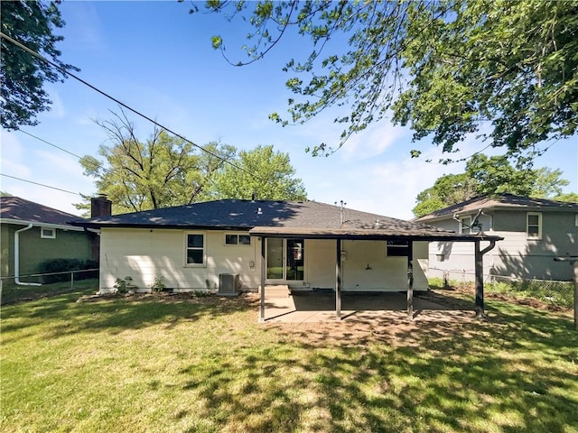 11709 Fremont Ave, Kansas City, MO 64134 - back of property featuring a patio, a chimney, and central air condition unit